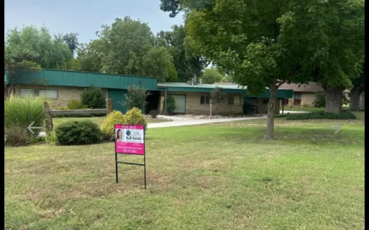 Uniquely crafted residential home on corner lot