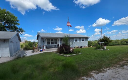 Charming 3-Bedroom Home with Rec Room, Garage & Spacious Lot