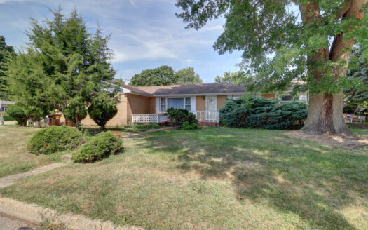 One owner ranch home sits on a spacious corner lot