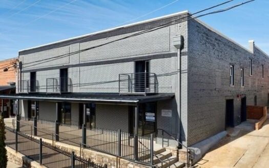 Modern Downtown Living with a Balcony Overlooking Depot Street!