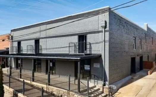 Modern Downtown Living with a Balcony Overlooking Depot Street!