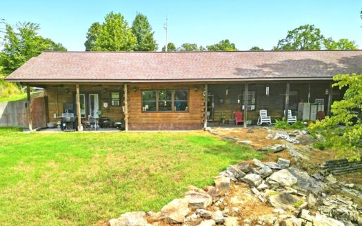 Earth-Berm Log Home on 19 Acres with Pond & Springs