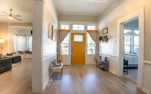 Welcome to this updated Folk Victorian home filled with charm