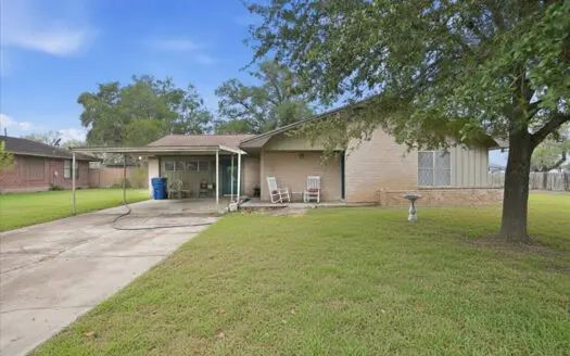 Well-Maintained Brick Home With Extra Living Space & Large Yard