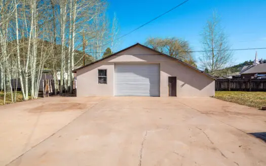 3 bedroom on large in-town lot with workshop