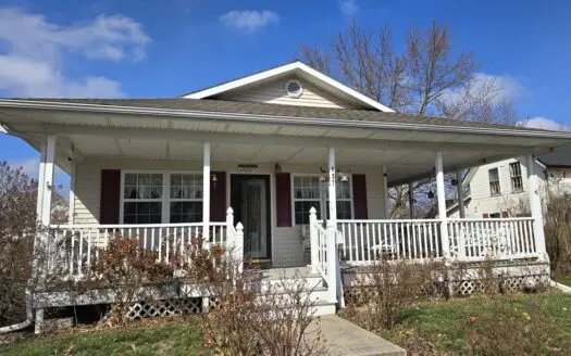 Immaculate Home with Wrap-Around Porch & Workshop Garage!