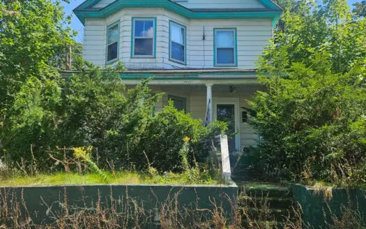 Charming Victorian Fixer-Upper on Corner Lot – Endless Potential!