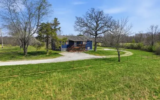 Spacious Country Retreat on 22.6 Acres with Dual Living Potential