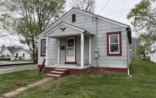 Newton Gem with 2 Garages, Patio Retreat and Prime Location