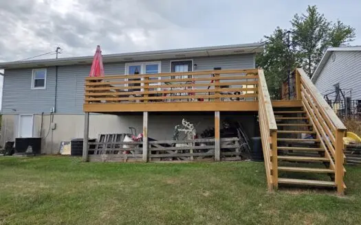 Charming 3-Bedroom Home with Rec Room, Garage & Spacious Lot