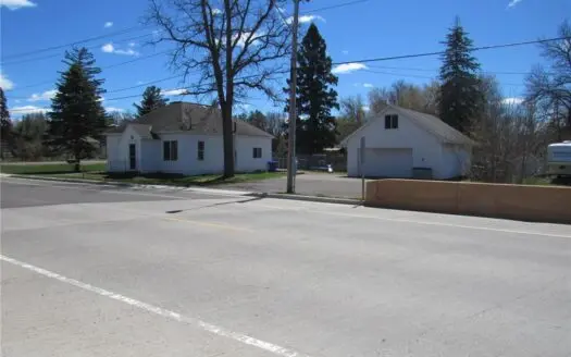 A Charming 2-Bedroom, 1-bath Home Situated on Two City Lots