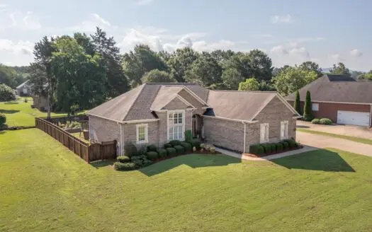 ALL BRICK home in Cotton Creek with fenced backyard and 4 BRs