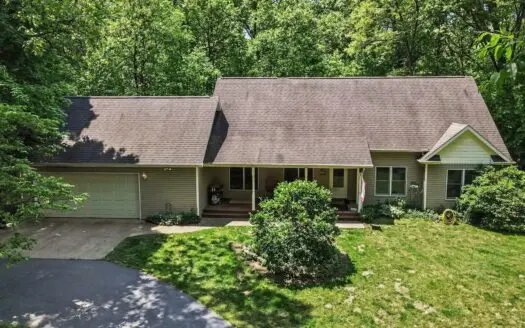 Custom built home in the woods with a 38′ X 56′ Pole Building