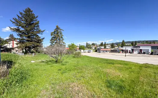 Investment Opportunity on 5 City Lots with Main Street Frontage