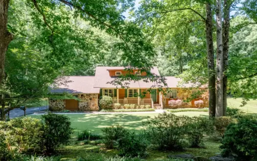 Beautiful oversized lot with large home and flowing creek
