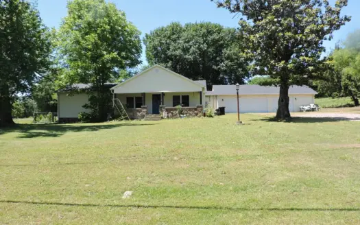 Space, Comfort & Convenience — 6 Acres In Town!