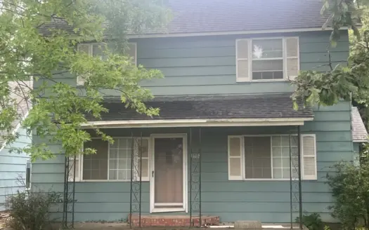 Home in Town with Detached Garage for Sale in La Harpe, KS