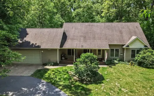 Custom built home in the woods with a 38′ X 56′ Pole Building