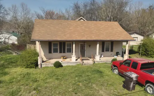 In-Town TN Home with 24×36 Shop Near Buffalo River for Sale!