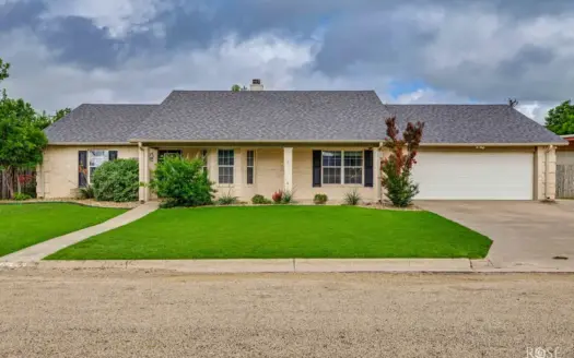 Spacious Brick Home with Entertainment Barn & Privacy-Fenced Back
