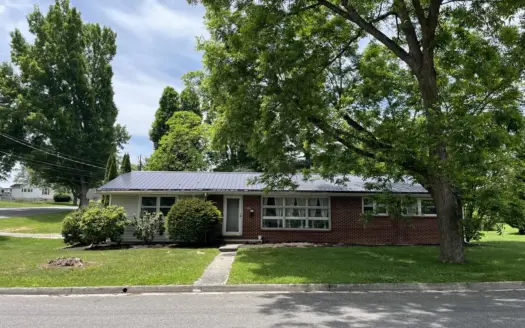 Home in town located on large corner lot.