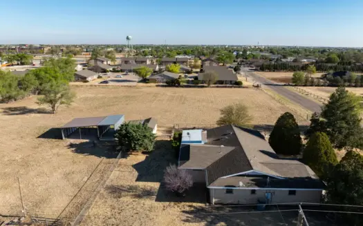 Brick home sitting on over 2.5 acres right in town!