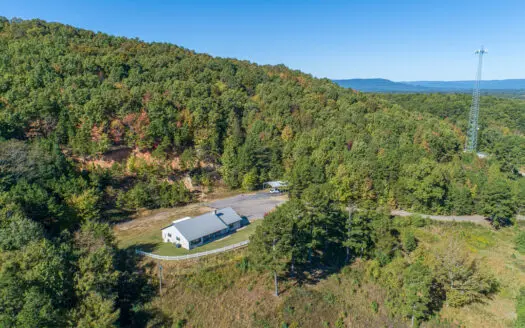 34 Acres with Stunning Mountain Views – Income-Producing Home