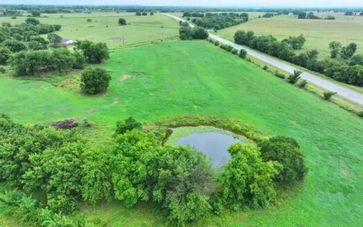 Excellent Investment 11.56+/- Acres w/ Highway Frontage & Pond