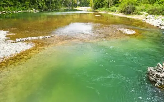 104.5 Acres w/ Bryant Creek Frontage & Custom Shouse