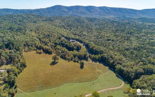 Country home & 64 acres, shop, barn, custom home & guest house