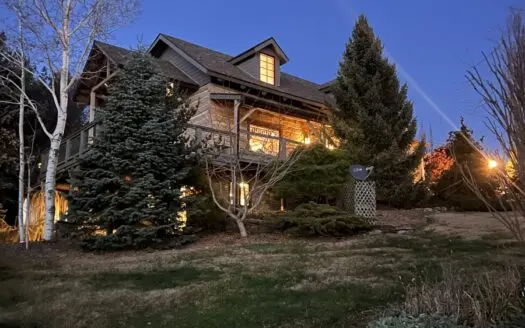 One of a Kind Lucas County Acreage with Custom Log Home