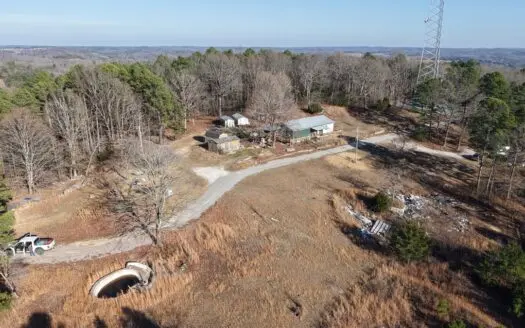 Land and fixer up home for sale in Arkansas