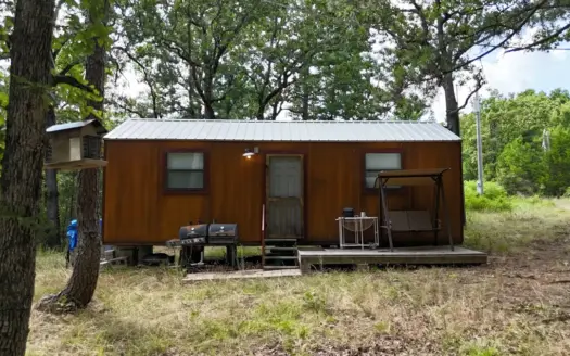 Cabin on 11.24 Acres Remote property with electric.