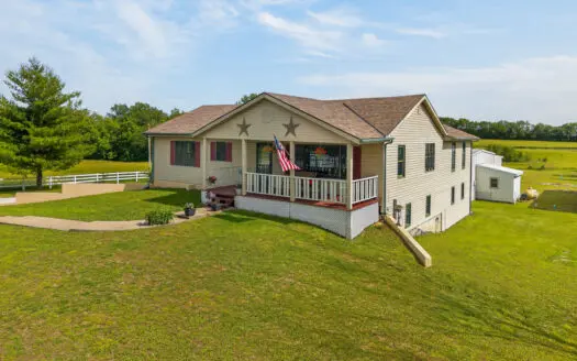 Country Home with Acreage and Shop Buildings Near KC