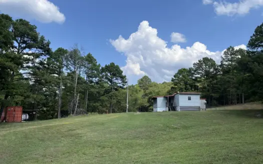 40 Acres with Home, Cabin, Pond & Timber in Southeastern OK