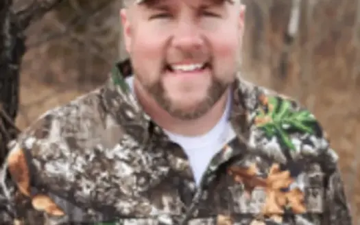 agent profile picture for Travis Hamele on hunting properties website