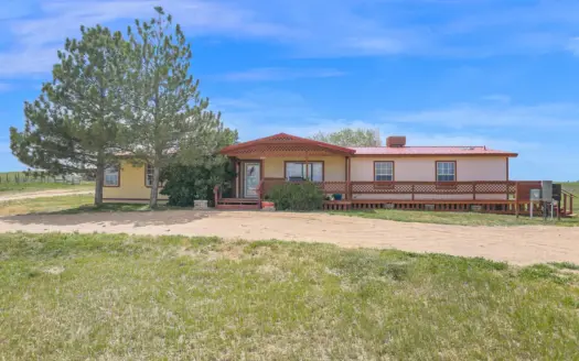 Country home for sale with acreage in Colorado