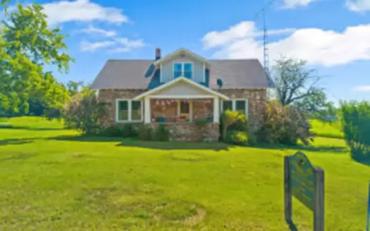 Historic Michigan Farmstead with 22.50 Acres Atlanta MI