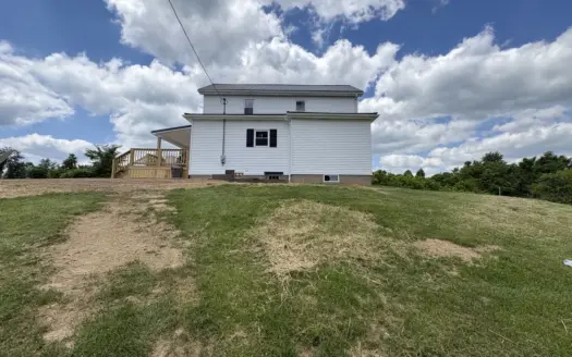 Remodeled Farmhouse on 18.8 Acres with bank barn