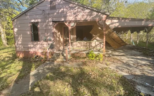 Investment Home in Town for Auction Clarksville Texas