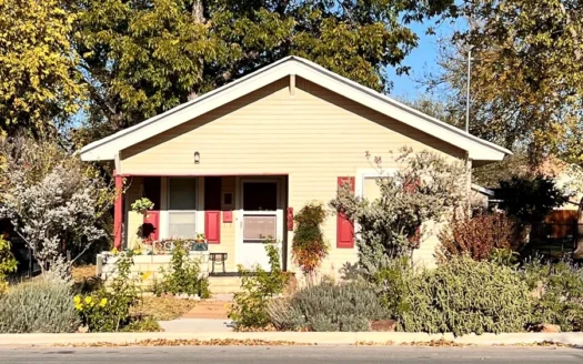 Cute Two Bedroom Two Living Room House with Covered Porch