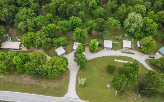 20 Acres Near Bull Shoals Lake with 2 Homes and 5 Cabins