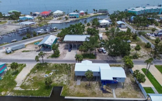 Waterfront Living with Gulf Views, Sunsets & Income Potential!