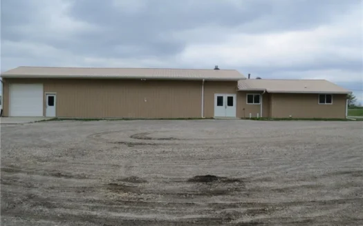 65,936 sq ft Facility with Large Parking Area and Garage