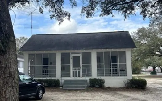 Discover a prime investment duplex just mins from the hospital