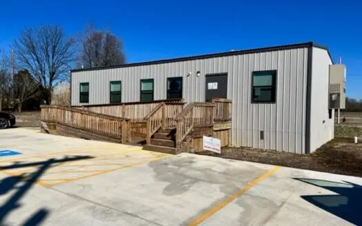 Commercial Building with parking lot and Hwy frontage