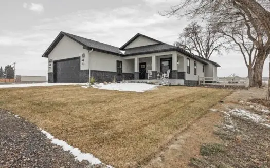 Home in Town with Small Acreage For Sale