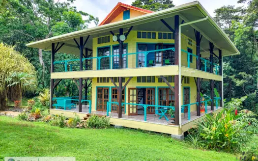 Titled Waterfront Home with Elevated Sea Views and Breezes