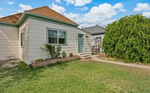 Home on a Double Lot with Investment Opportunity