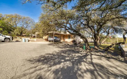 In-Town Acreage with Shop & Dual Access